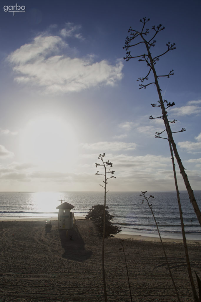 lifeguard tower in setting sun